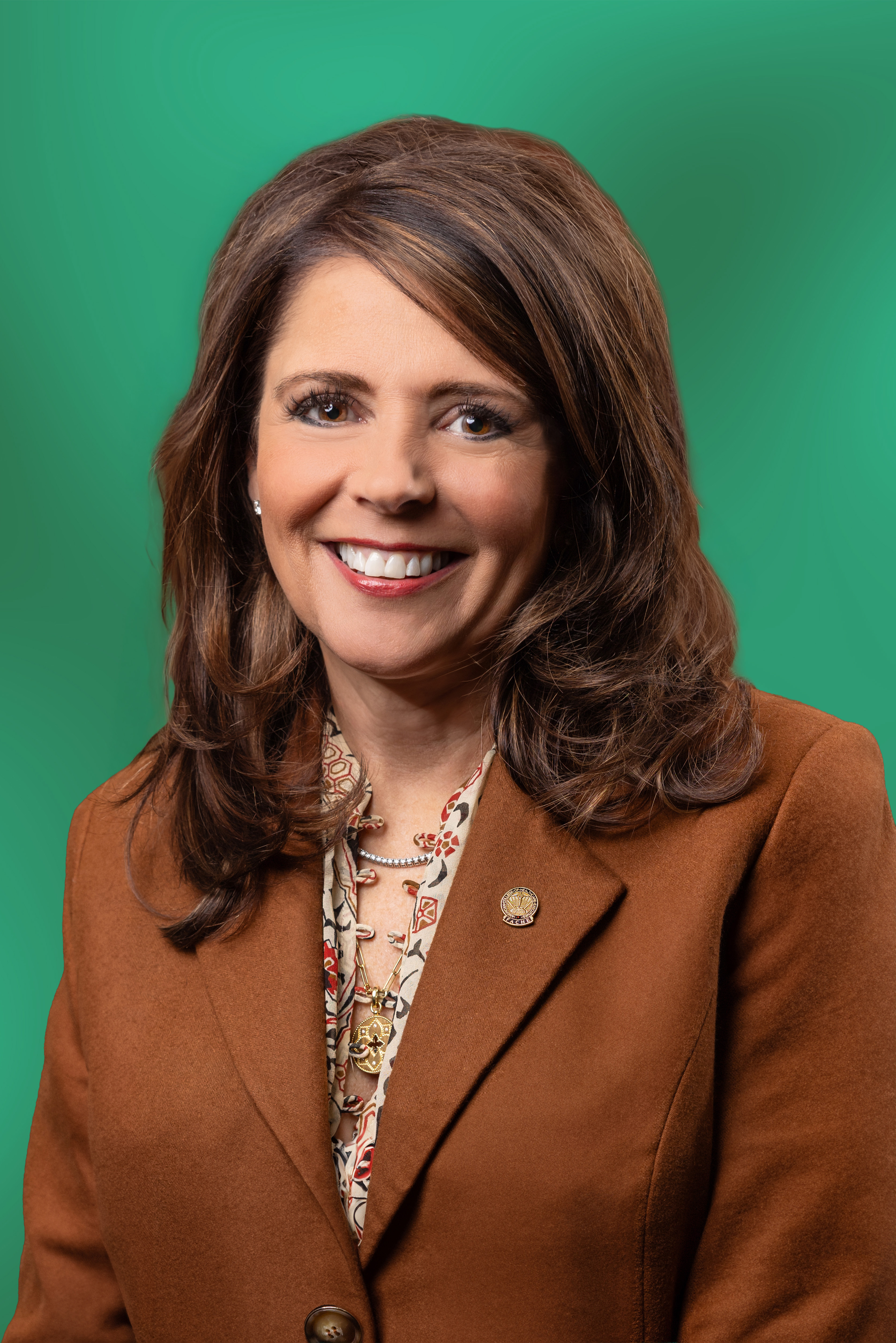 Michele Kidd Sutton, President & CEO